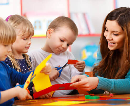 Preschoolers exploring materials together